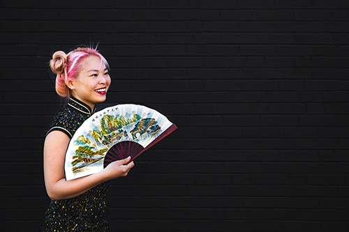 photo of a Chinese girl with a fan