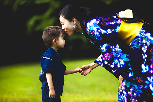 Japanese mother in traditional garb and son