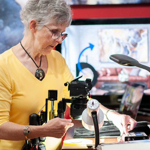 Photographer Debbie Brady at work on macro photos.