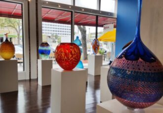 Display of glass vessels at a gallery