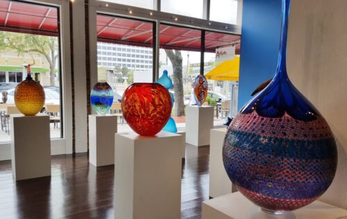 Display of glass vessels at a gallery