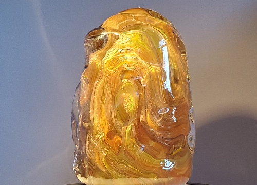 swirling golden glass sculpture by Steven Schaefer
