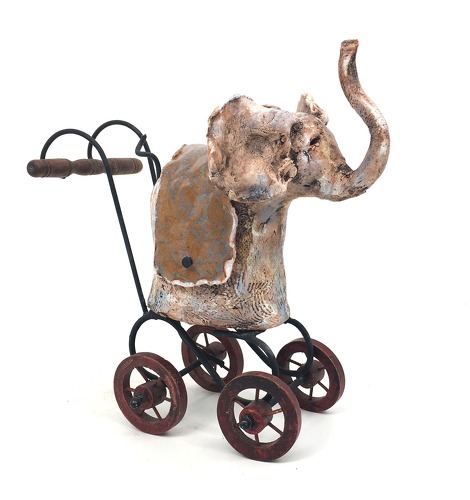 whimsical wheeled elephant sculpture by Mary Means