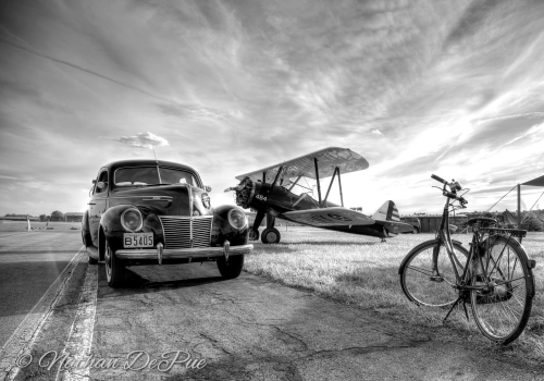 photo of a vintage car, bike and plane by Nathan DePue