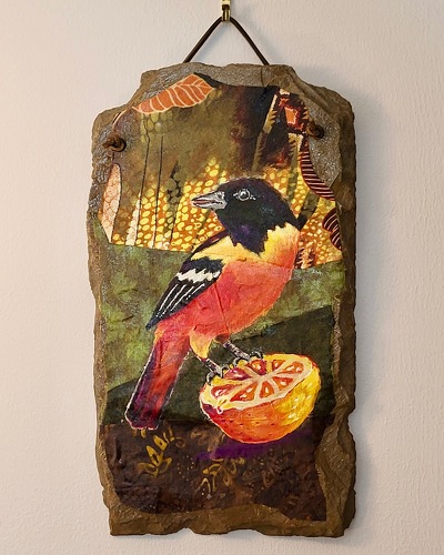 Baltimore oriole fiber art on slate