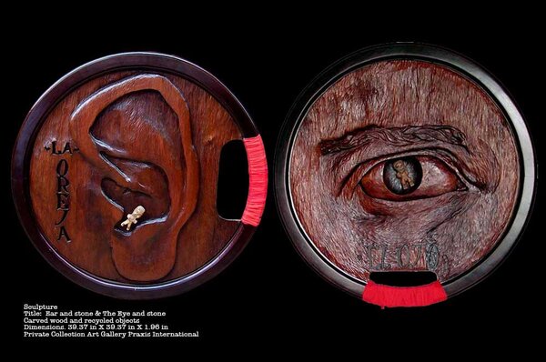 Sculptures of an eye and ear by Fermin Fleites
