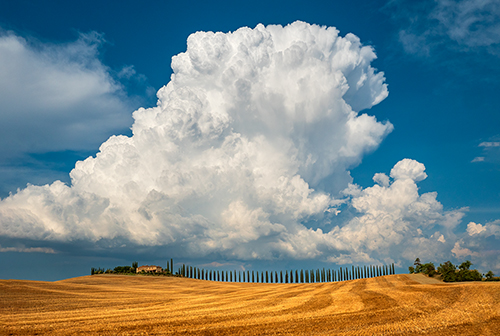 Dramatic landscape photo of Italy with clouds