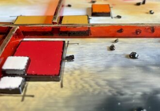 detail of a work of fused glass art by Anne Burtt