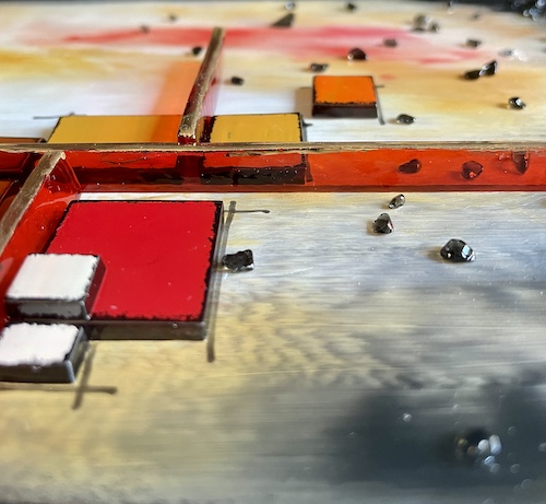 detail of a work of fused glass art by Anne Burtt