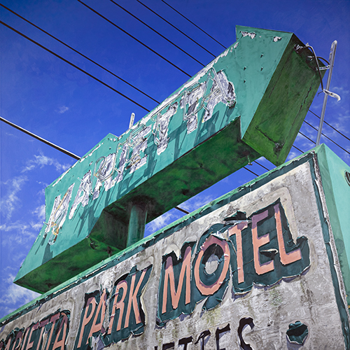 painting of an old rundown motel sign