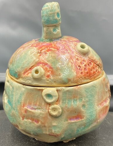 handbuilt nature inspired lidded ceramic jar