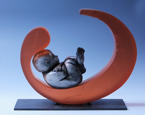 glass sculpture with infant by Mike da Ponte