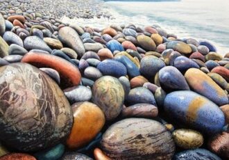 watercolour of colorful stones on a shoreline