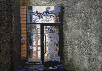 mixed media photograph of graffiti on pumice background