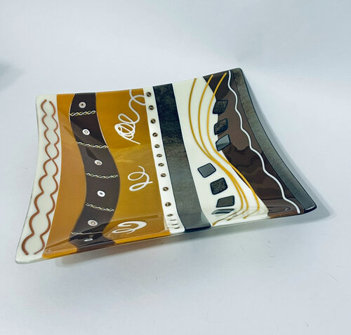 handmade fused glass plate in earth tones