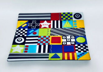 colorful whimsical geometric design fused glass plate
