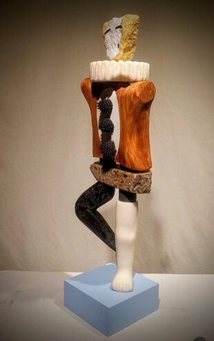 mixed media assemblage sculpture of a clown