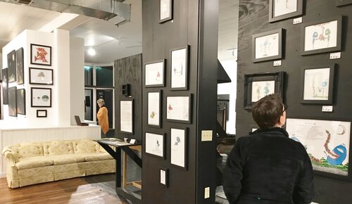 shoppers in an art gallery