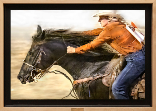 rodeo photo of a woman riding a fast horse