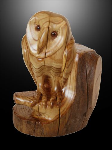 wooden sculpture of an owl