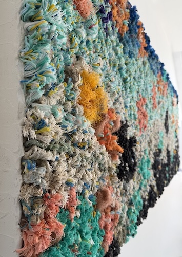 upcycled wall art created from industrial waste