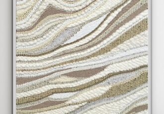 handwoven fiber art in neutral colors