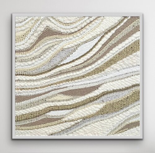 handwoven fiber art in neutral colors