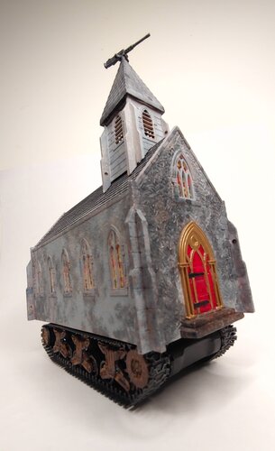 sculpture of a whimsical church/car