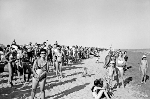 Photograph of people at a beach in Italy