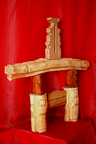 Gate sculpture of various woods