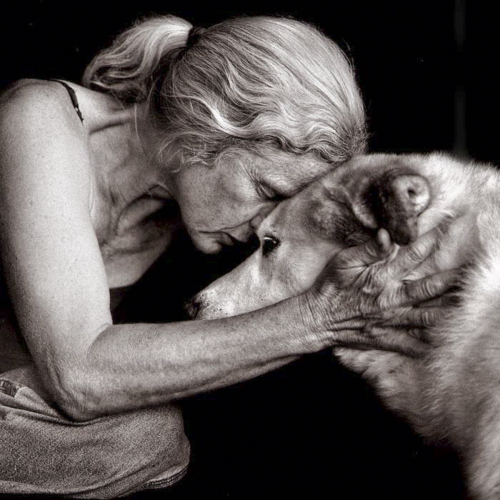 emotional photograph of a woman and her dog