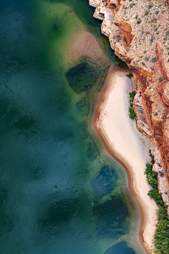 aerial photogaph of a beach and water